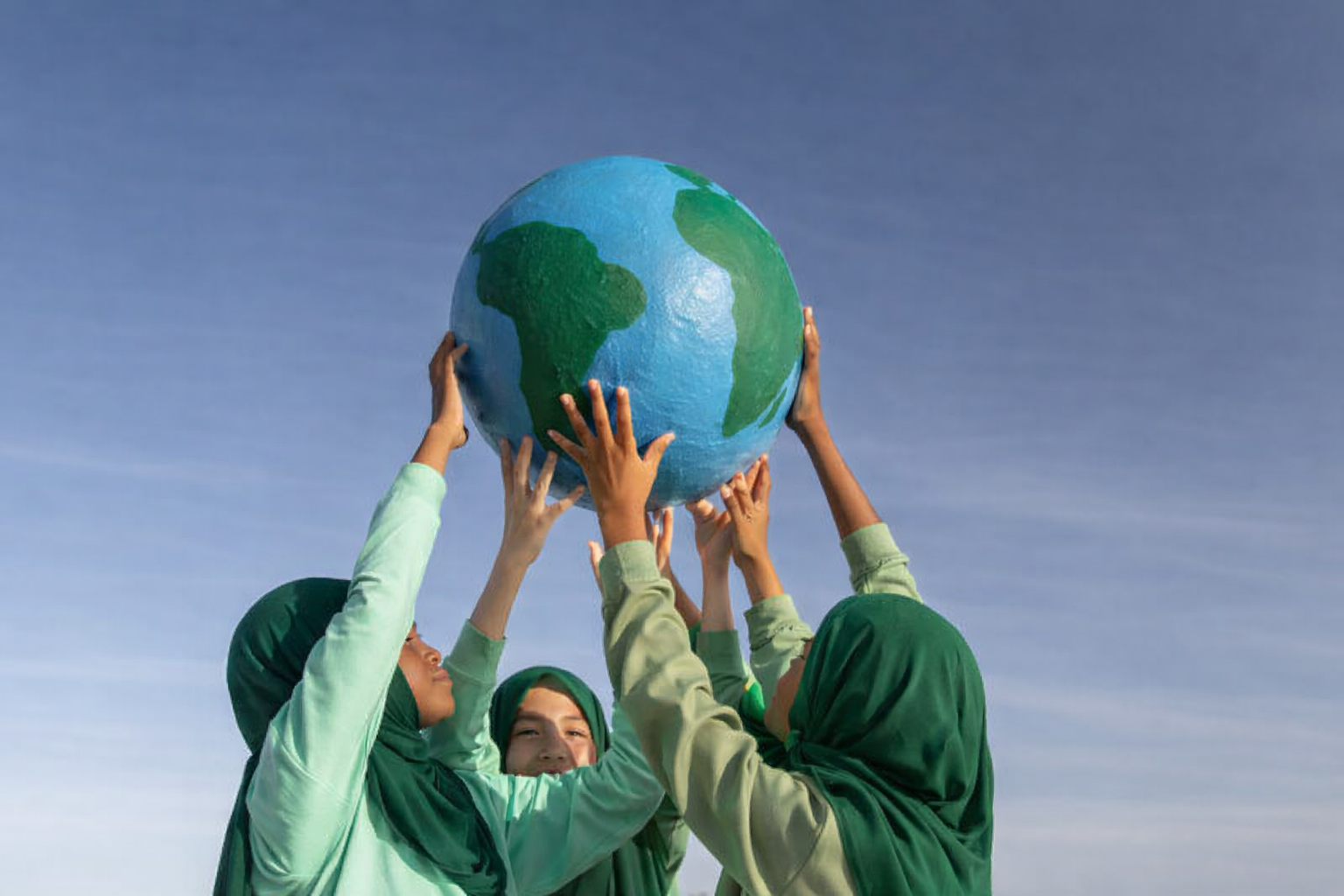 Youth holding the globe - UnionSphere